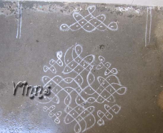 Pulli kolam with 9 dots
